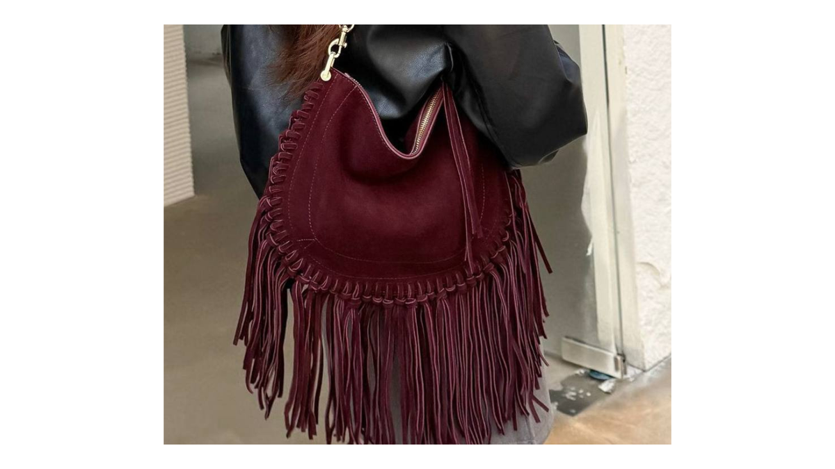 Burgundy suede fringe handbag featured in Fall 2026 handbag trends