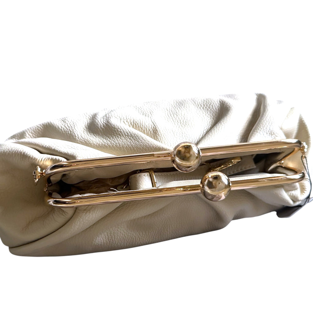 Italian leather kiss lock handbag side profile