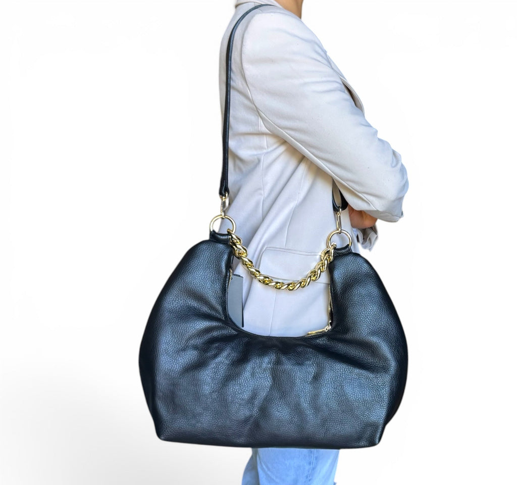model wearing Fiorenza black Italian leather shoulder bag handmade in Italy