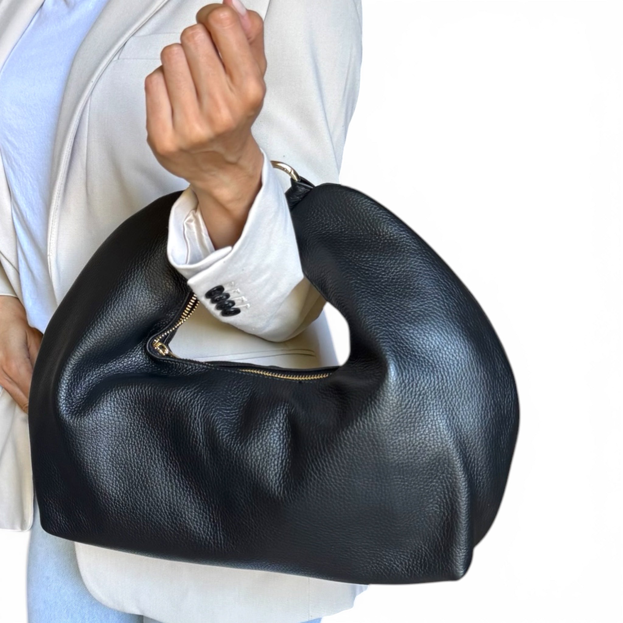 Woman carrying Fiorenza burgundy luxury leather shoulder bag