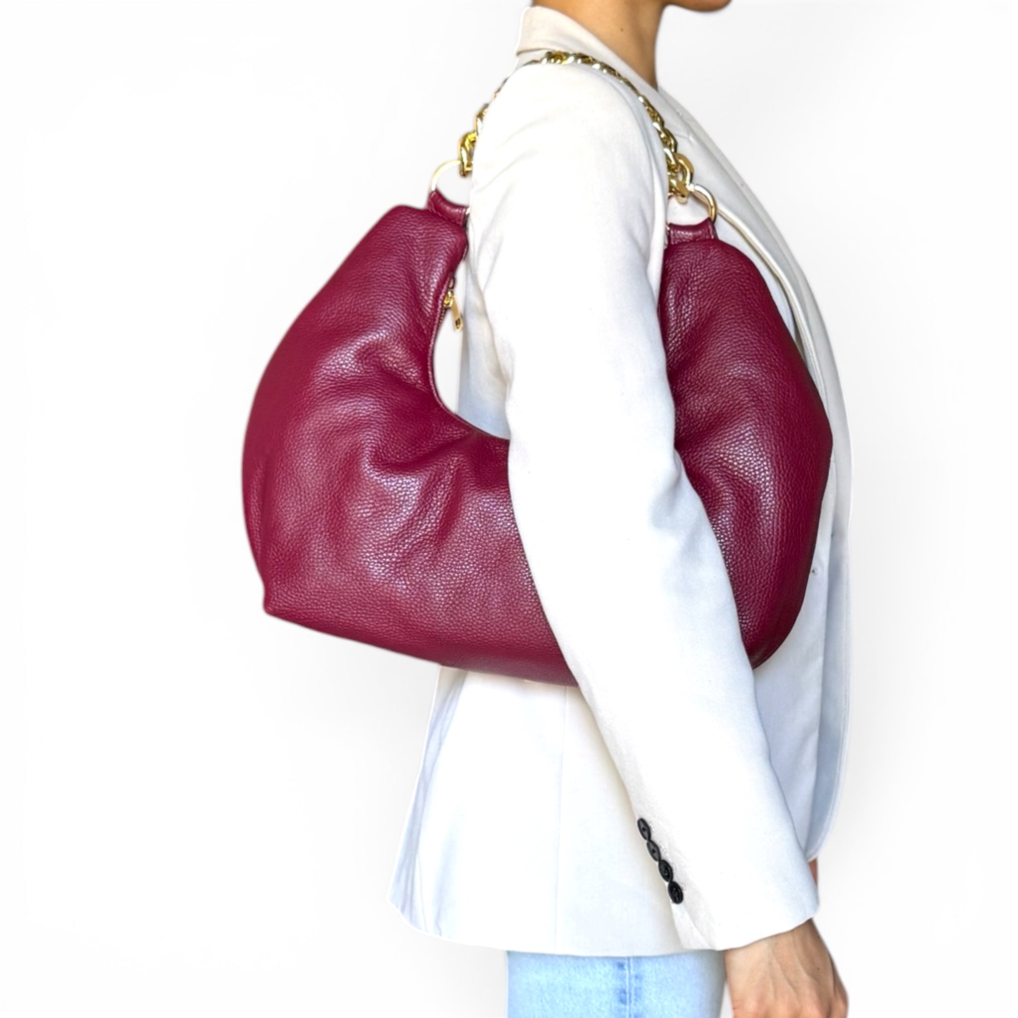 Woman wearing Fiorenza burgundy Italian leather shoulder bag handmade in Italy