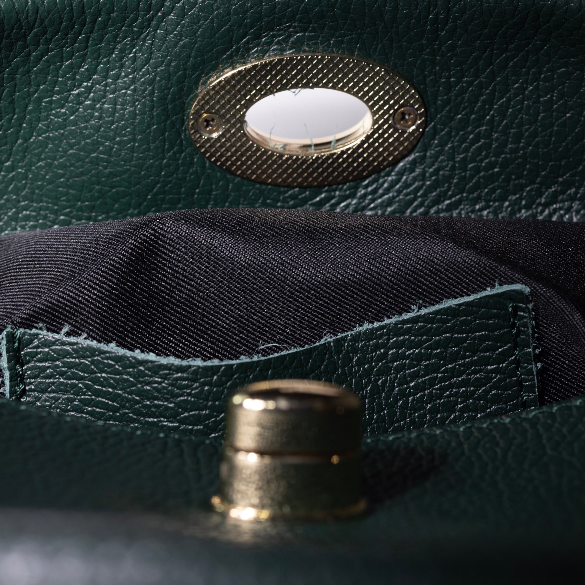 gold hardware detail on italian leather bag