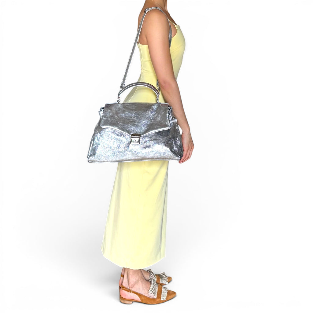 Women's metallic leather luxury handbag model view
