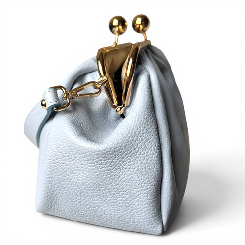 Italian leather kiss lock handbag side profile