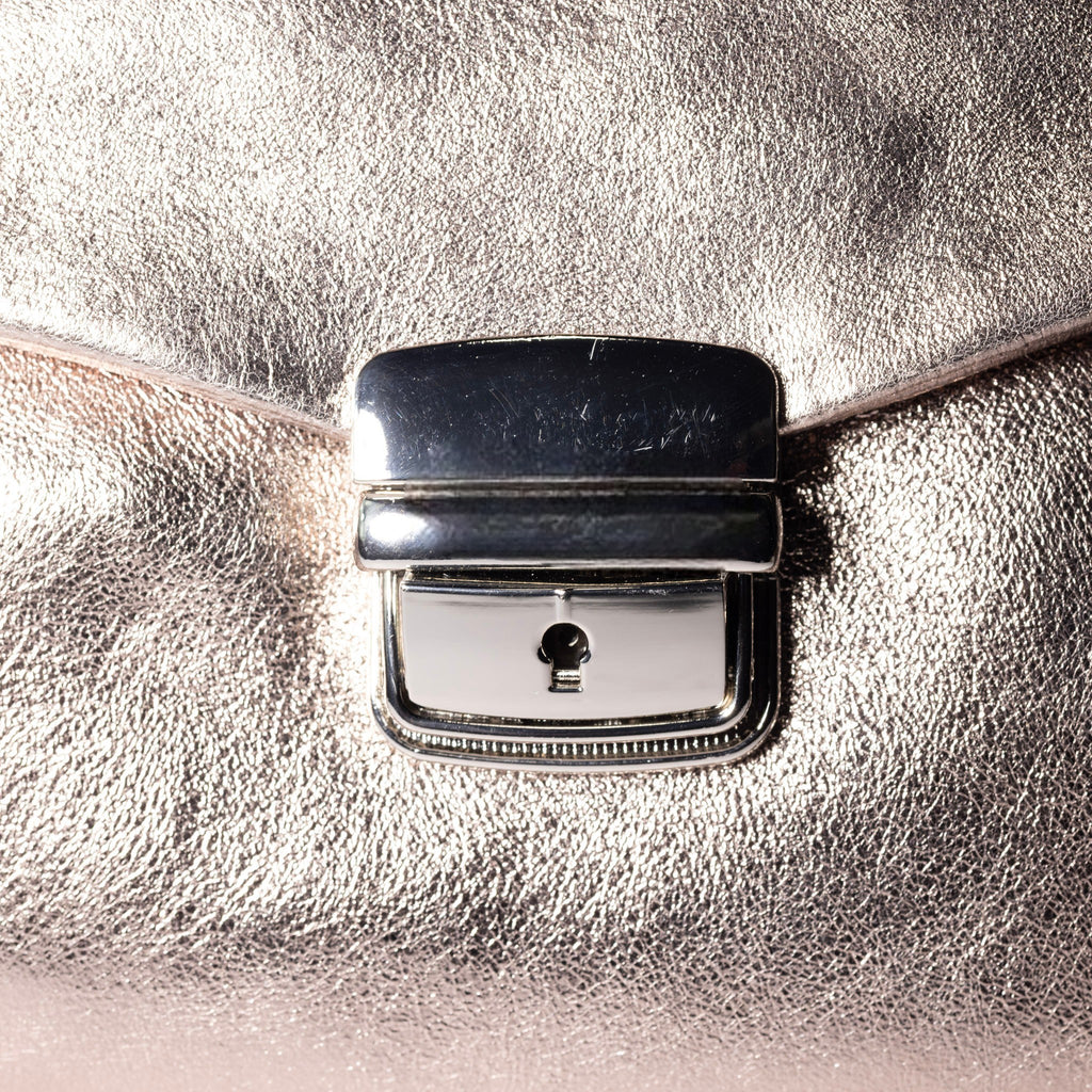 Secure front lock closure on Italian leather handbag
