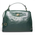 quiet luxury leather handbag front view