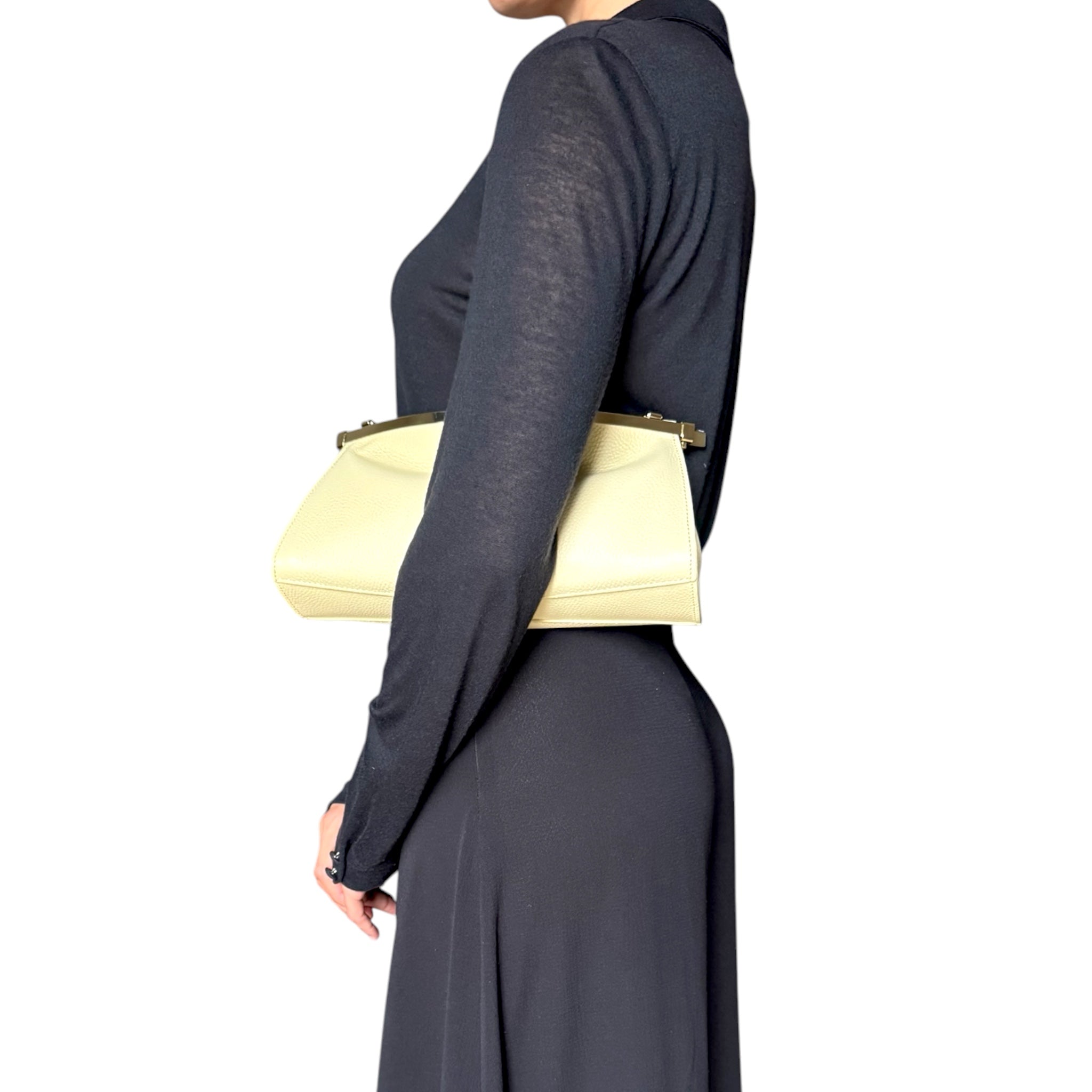 Minimalist Italian leather clutch bag in butter cream leather