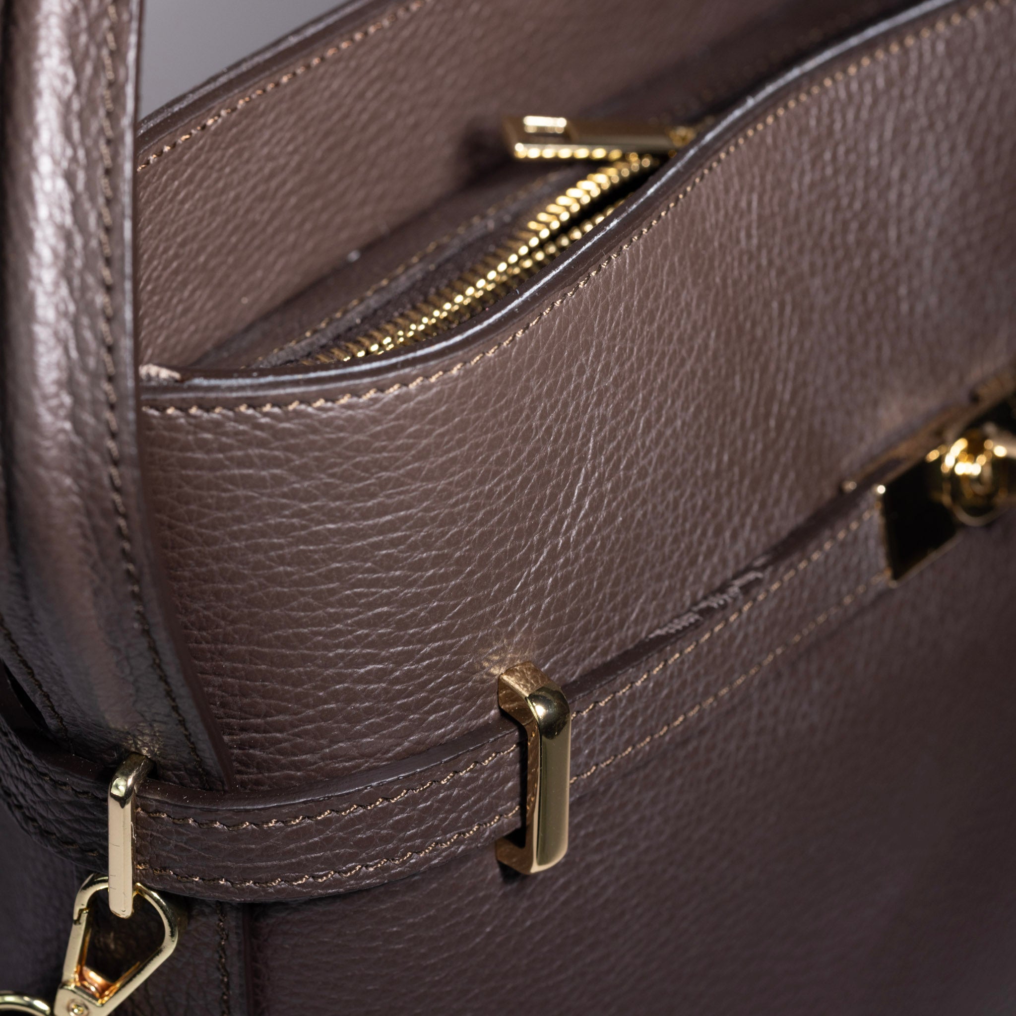 leather bucket bag worn shoulder