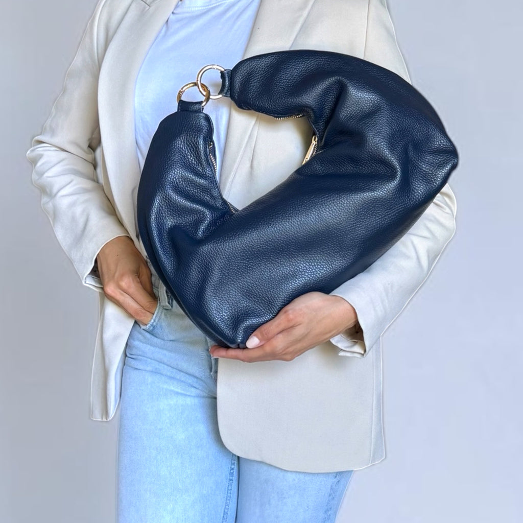 model carrying Fiorenza dark blue luxury leather shoulder bag