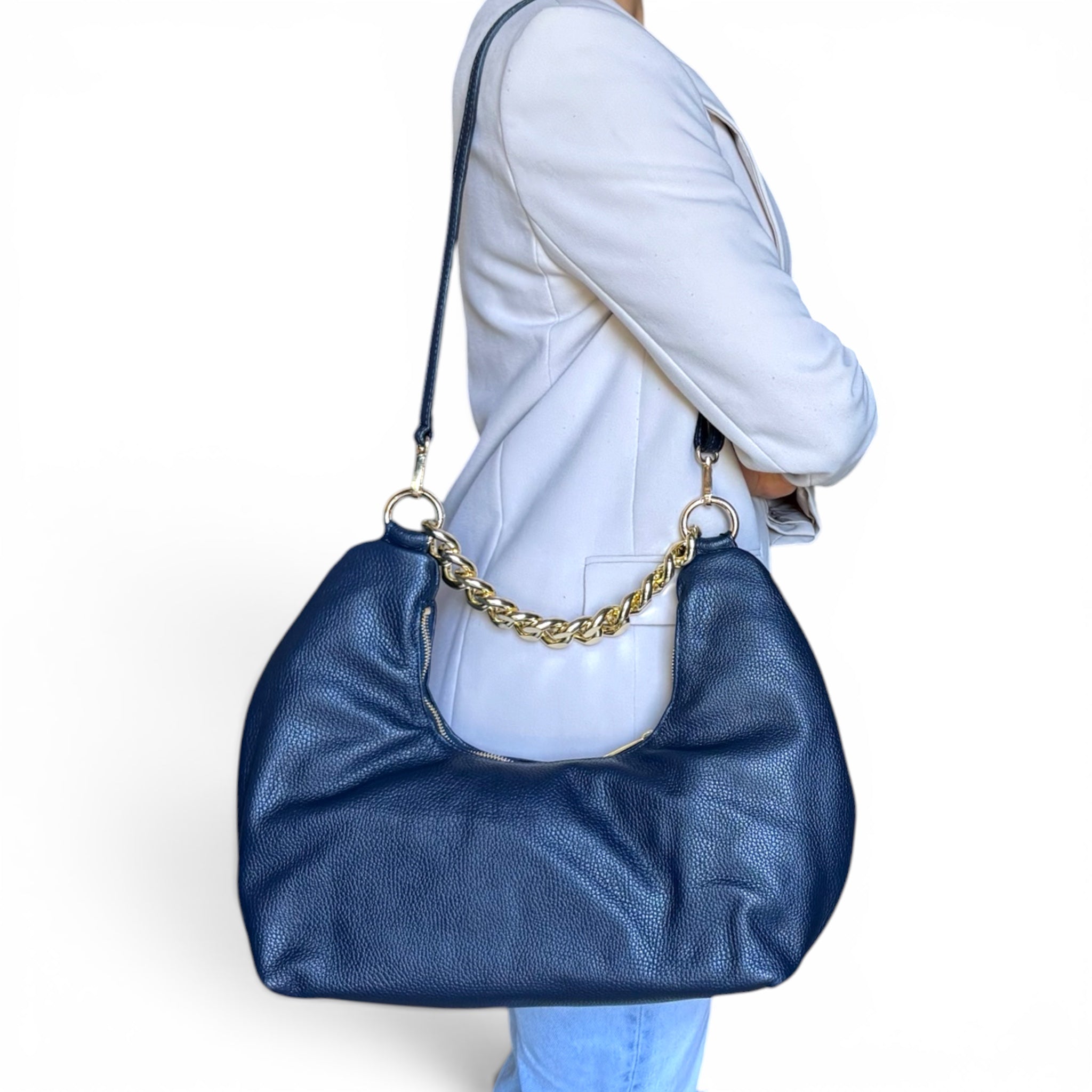model carrying Fiorenza luxury leather shoulder bag with leather strap